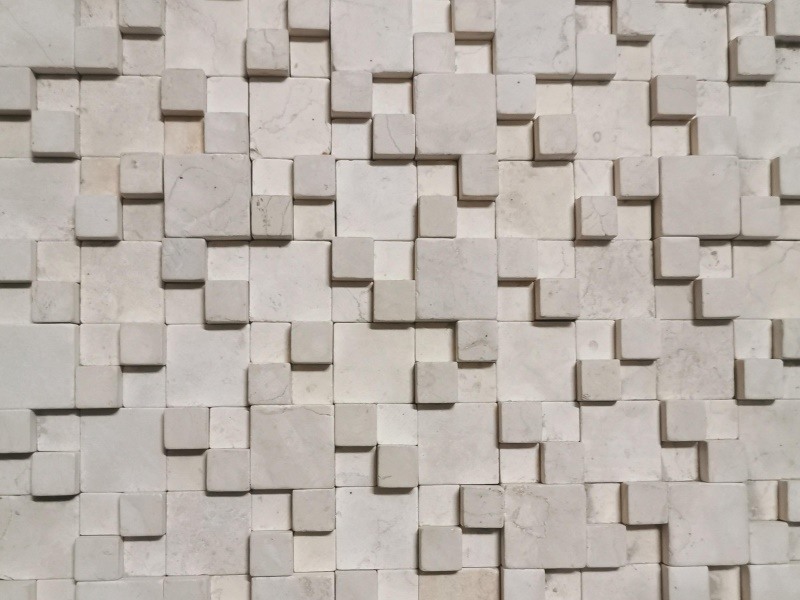 https://www.wanpomosaic.com/uploads/China-Supplier-Uneven-3D-Square-Beige-Stone-Mosaic-Tile-For-Sale-1.jpg
