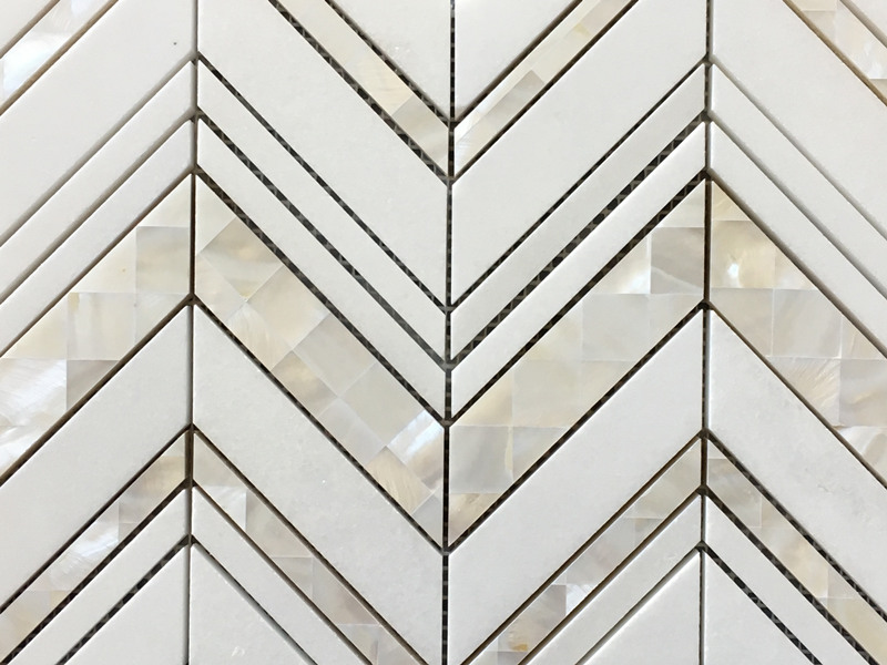 https://www.wanpomosaic.com/high-quality-thassos-and-mother-of-pearl-tile-white-chevron-backsplash-product/